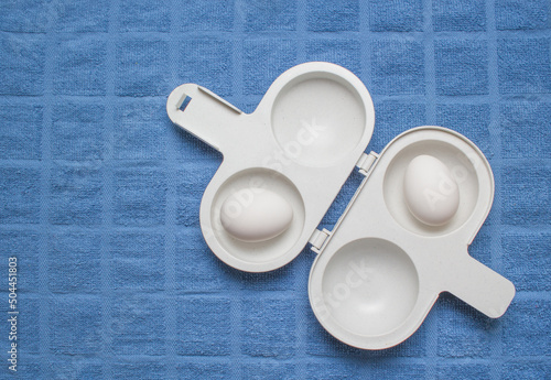 Two cup egg poacher with copy space photo