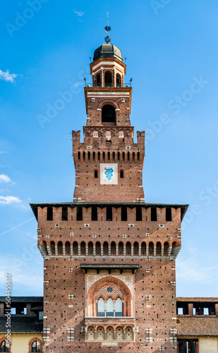 The tower of the Filarete, side facing the inner courtyard, at the entrance of the Castello Sforzesco, medieval fortification in Milan city center, Lombardy region, northern Italy.  photo