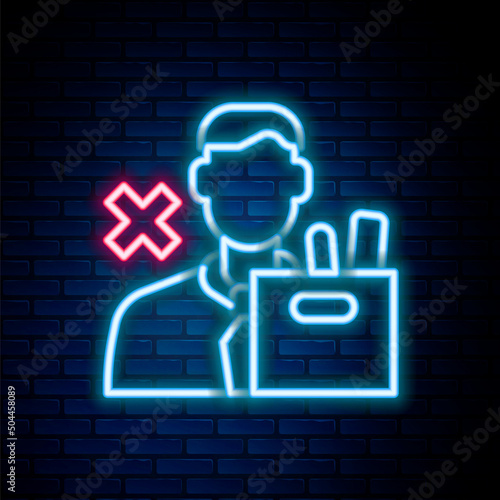 Glowing neon line Dismissed sad young man carrying box with his personal belonging leaving his job icon isolated on brick wall background. Employee fired from work. Colorful outline concept. Vector