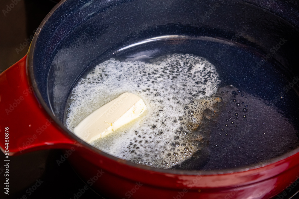 in a saucepan on the stove melt butter for the preparation of bechamel sauce and other dishes. in a saucepan on the stove melt butter for the preparation of bechamel sauce and other dishes.