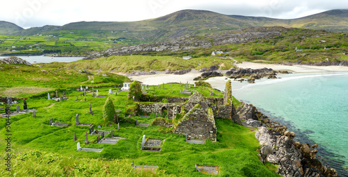 Abbey Island, the idyllic patch of land in Derrynane Historic Park, famous for ruins of Derrynane Abbey and cementery, County Kerry, Ireland photo