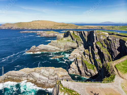 Amazing wave lashed Kerry Cliffs, widely accepted as the most spectacular cliffs in County Kerry, Ireland. photo