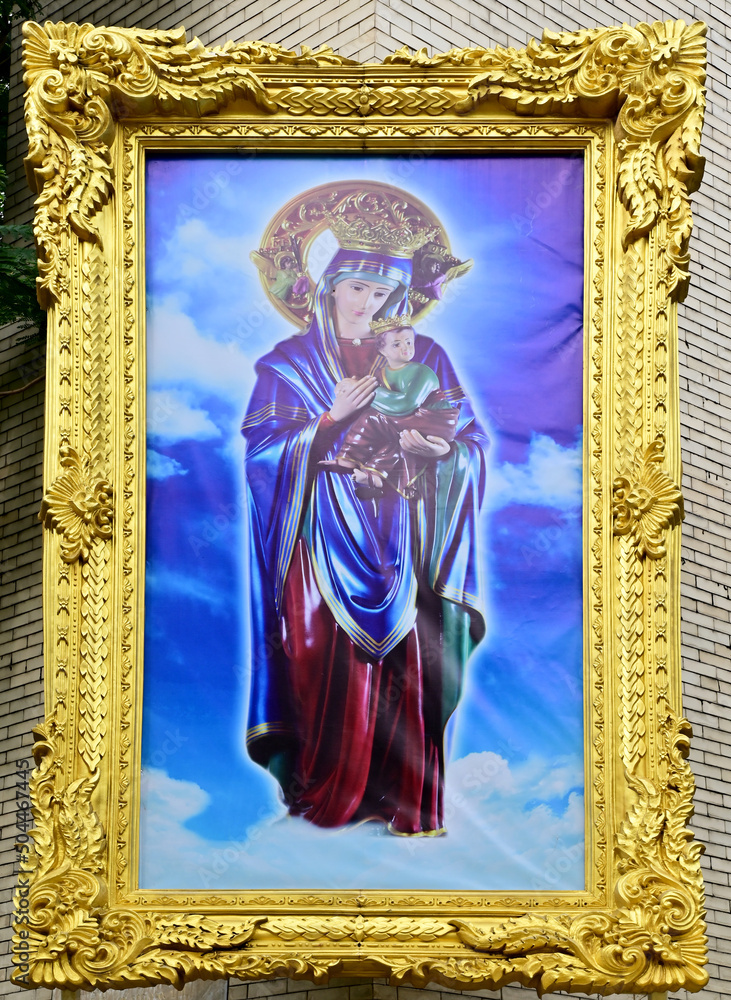 Fototapeta premium Closeup of Our lady of perpetual help statue virgin Mary with Child Jesus in the church, Thailand. selective focus.