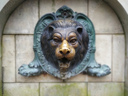 fountain with a lion's head in Bucha