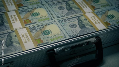 Money Revealed In Briefcase Opens And Closes photo