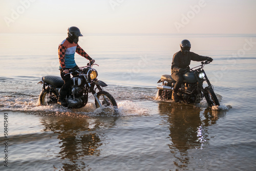 Two riders on scramblers photo