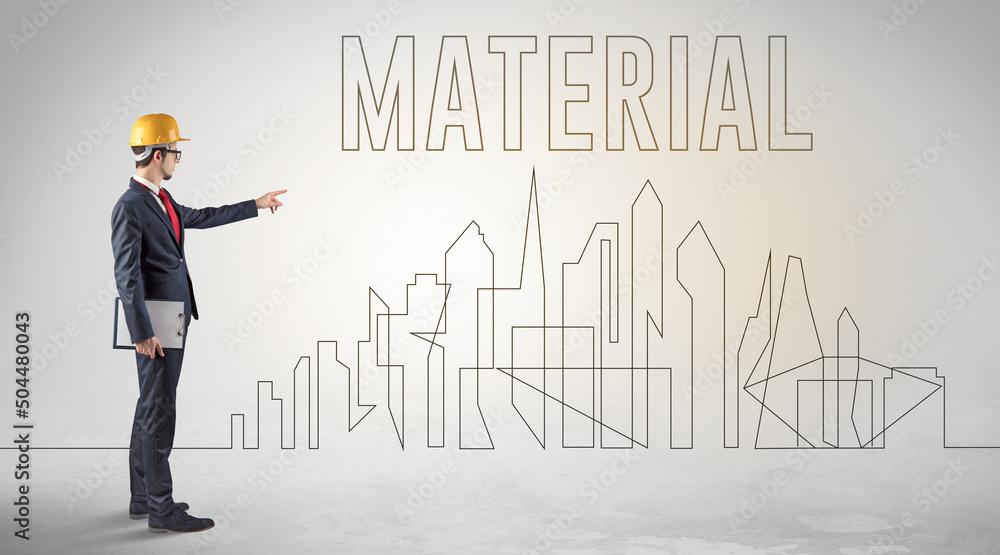 Businessman in hard hat holding blueprint Businessman in hard hat holding blueprint