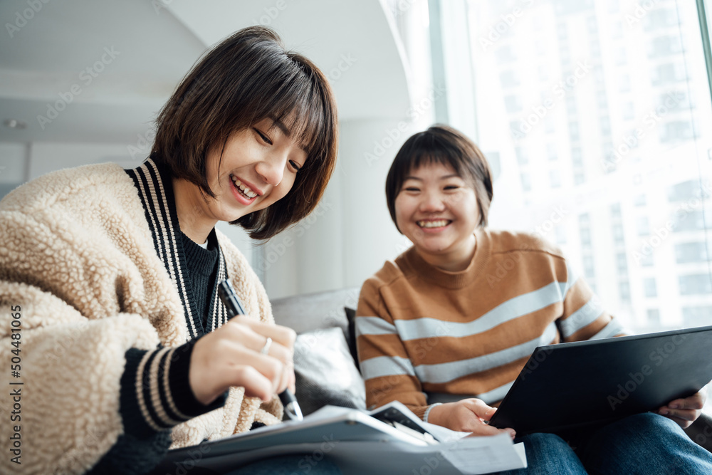 Two casual businesswoman talking in office Two casual businesswoman talking in office