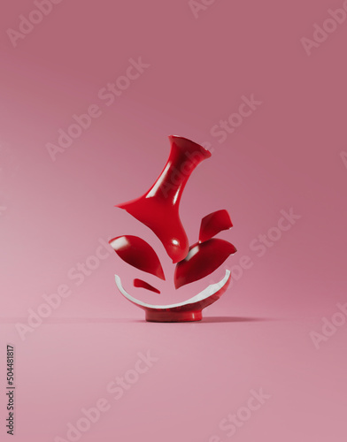 Broken red vase. photo