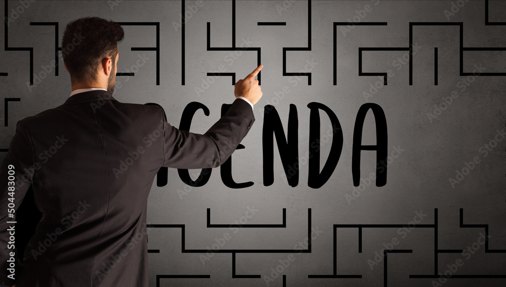 businessman drawing maze concept businessman drawing maze concept