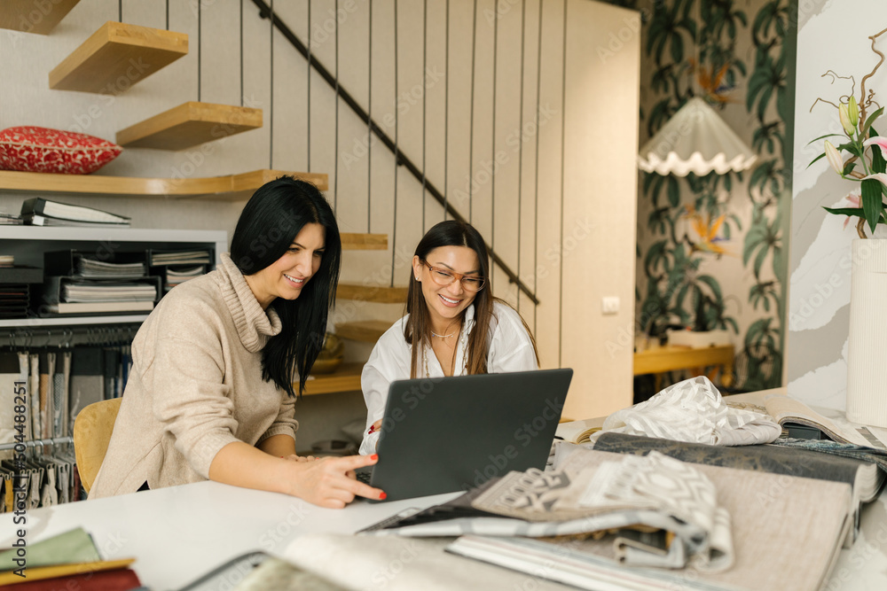 Colleagues Working In A Home Office Colleagues Working In A Home Office
