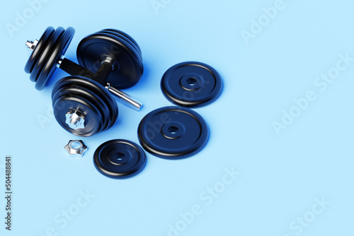 Black  iron dumbbells with disassembled plates on  blue isolated background. 3D rendering photo