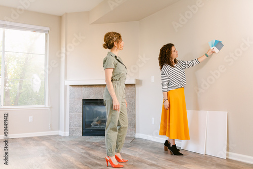 Women choosing color for the housing accent walls photo