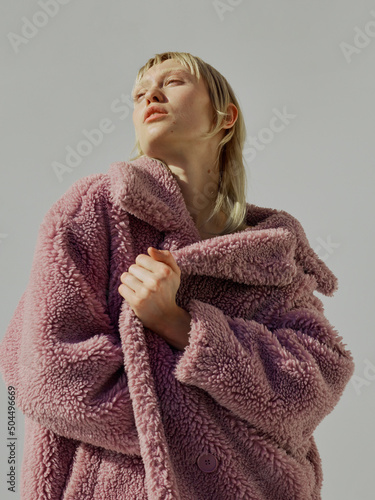 Static and cool portrait of a young fiercely woman - soft light  photo