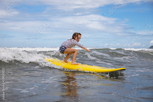 Young Girl Learning to Surf in Central America 
