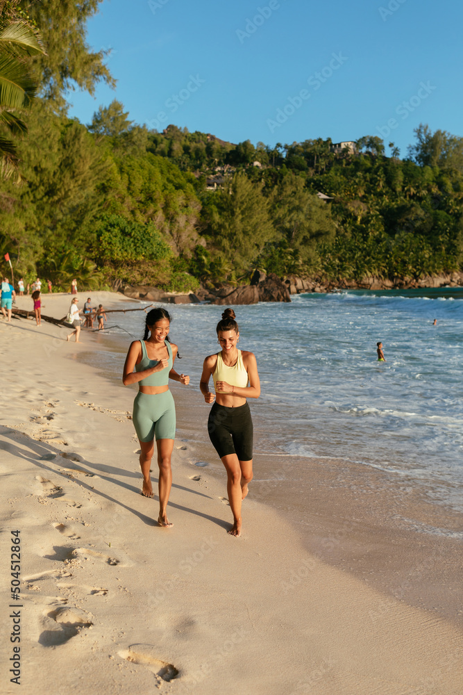 Women Running On The Beach Women Running On The Beach