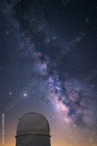 Milky way over an astronomical observatory telescope photo