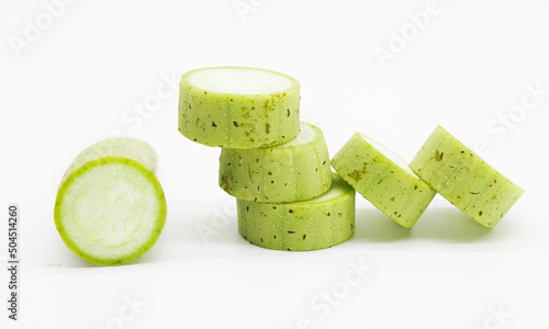 some pisces of fresh loofah or Sponge Gourd isolated on white background, photo