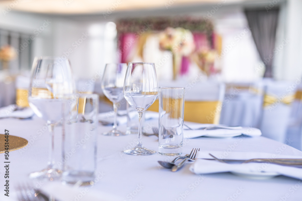 Wedding reception hall empty glasses close up