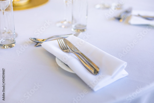 Indian reception tables, plates and cutlery close up