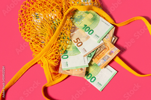 Money in string bag photo