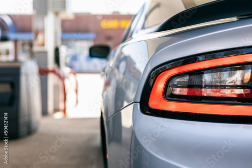 Focus On Car Taillight At Gas Pump photo