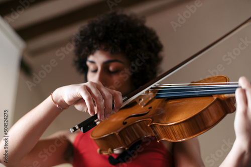 Musician playing the viola photo