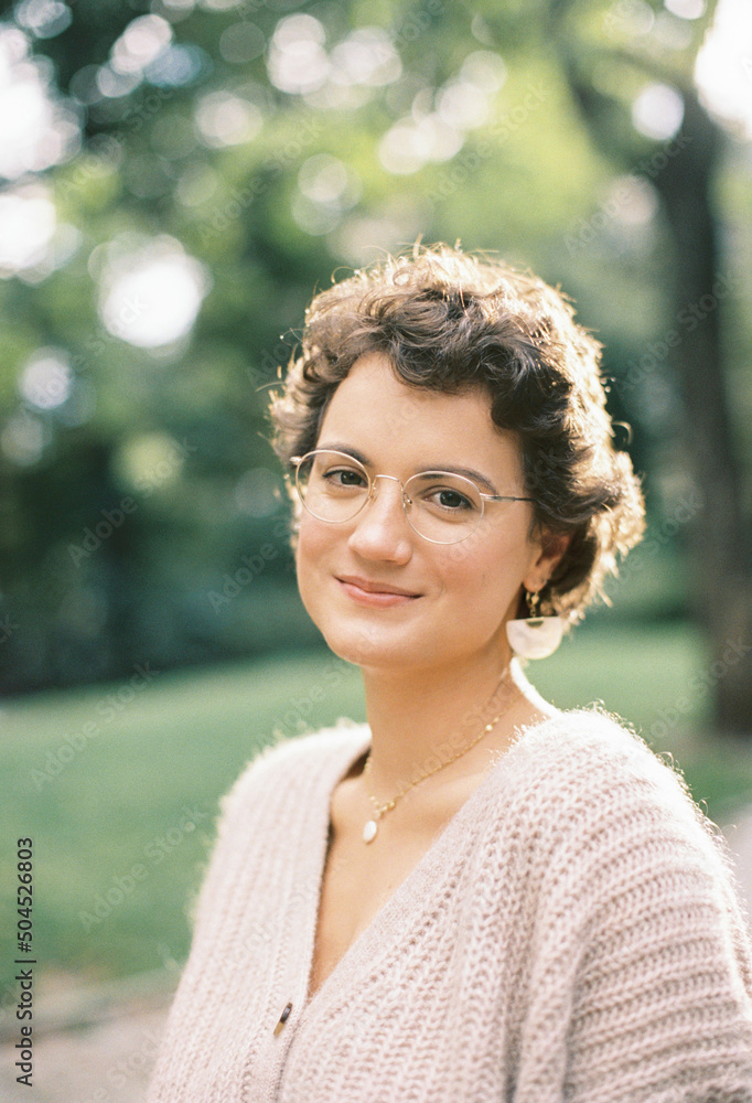 young woman with short hair in glasses young woman with short hair in glasses