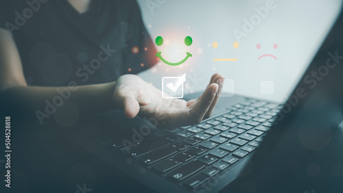 Customer satisfaction very good service by laptop, impression of take care and attention, choose a excellence face icon, answer the survey, give the highest score, very happy feedback from guest.