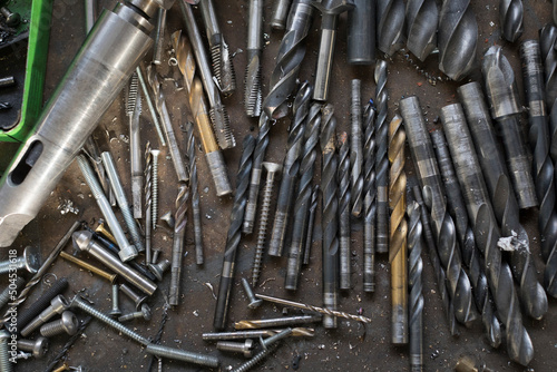 drill bits with screws, nails and blacksmith tools