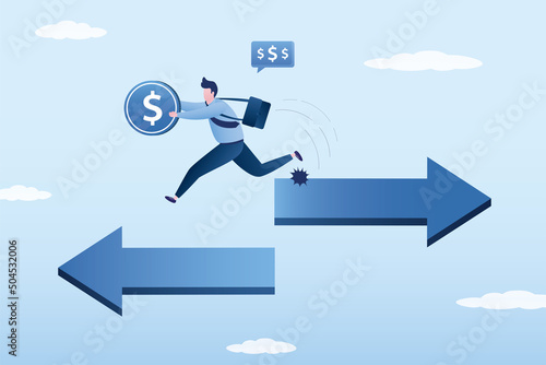Trader hold money and change from arrow sign to other direction. Changing trend on stock exchange, investing in another asset. Businessman decides to go different path. New way or opportunity.