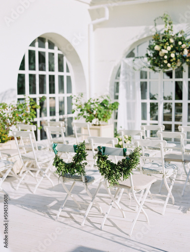 White Chairs For Wedding Party
