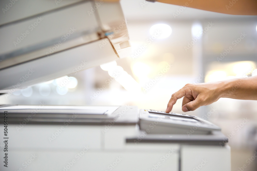 Copiers printer, Close up hand office man press copy button on panel to