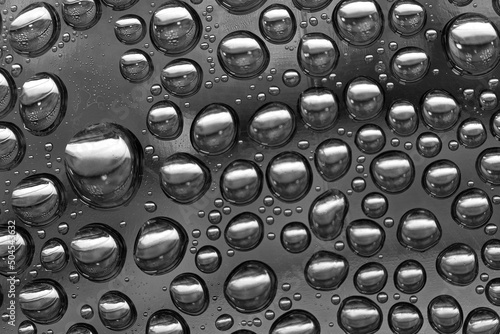 Condensation 44 macro closeup water droplets on dark plastic photo