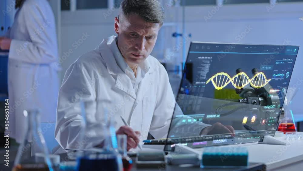 DNA lab scientist studying human genome structure on holographic screen research DNA lab scientist studying human genome structure on holographic screen research