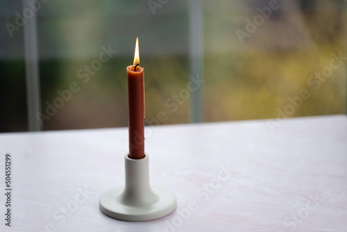 Candle in candle holder