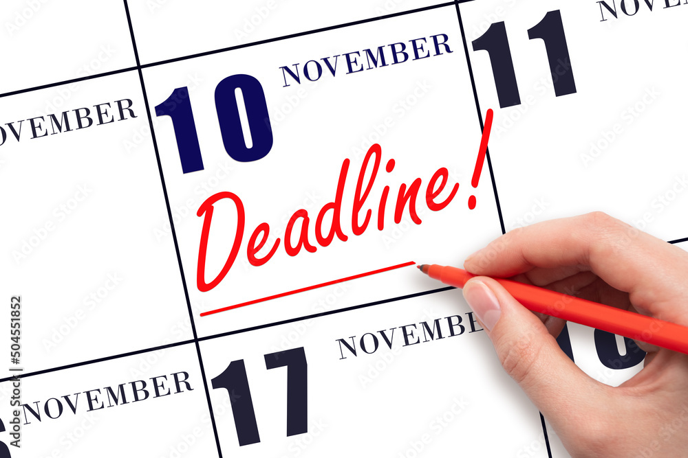 Hand drawing red line and writing the text Deadline on calendar date November 10. Deadline word written on calendar Hand drawing red line and writing the text Deadline on calendar date November 10. Deadline word written on calendar