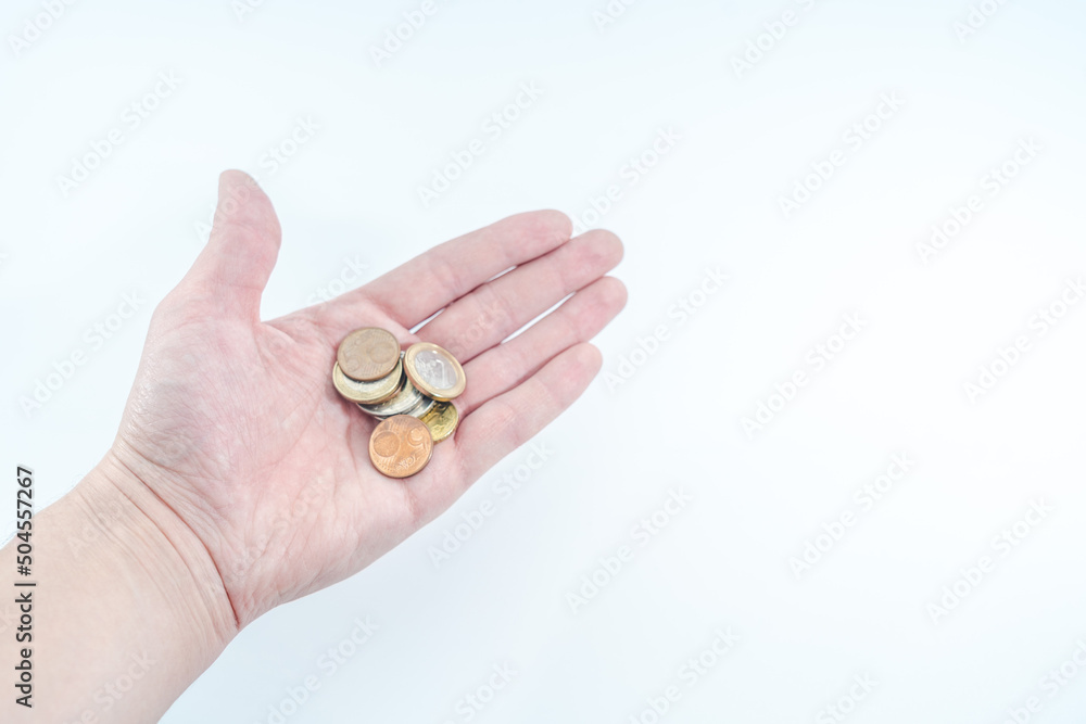 Man's hand with euro coins. Finance concept. Man's hand with euro coins. Finance concept.