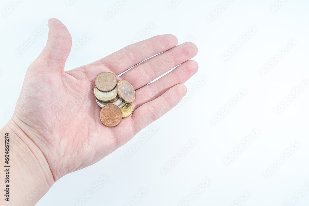 Man's hand with euro coins. Finance concept. Man's hand with euro coins. Finance concept.