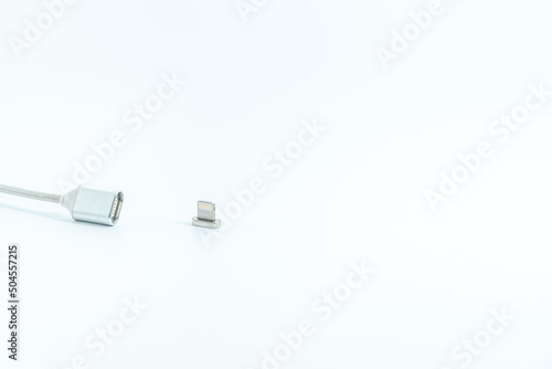 Magnetic charging cable (cord) isolated on white background