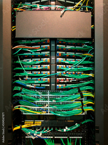 Wires into the back of a data hub. photo