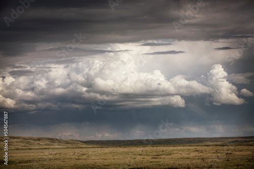 Clouds swirl during a summer rain storm.