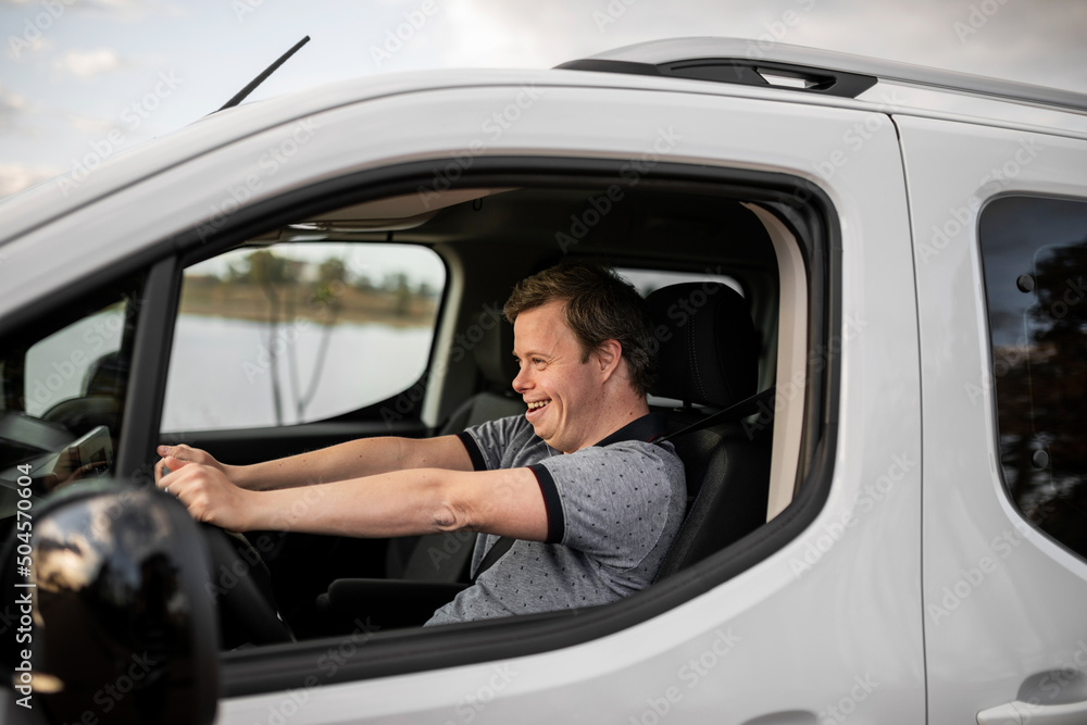 Man with down syndrome driving Man with down syndrome driving
