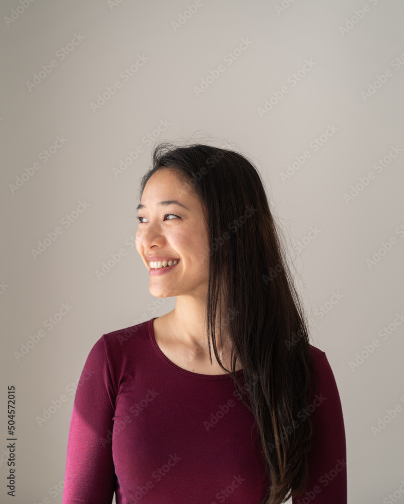 Smiling Asian Woman Looking On Side Smiling Asian Woman Looking On Side