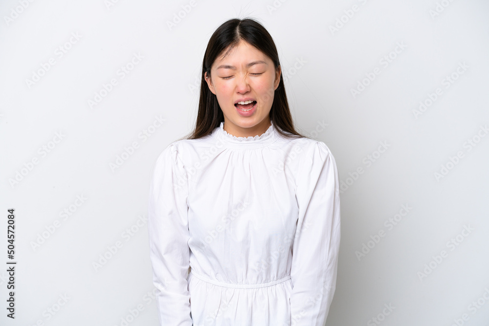 Young Chinese woman isolated on white background shouting to the front with mouth wide open Young Chinese woman isolated on white background shouting to the front with mouth wide open