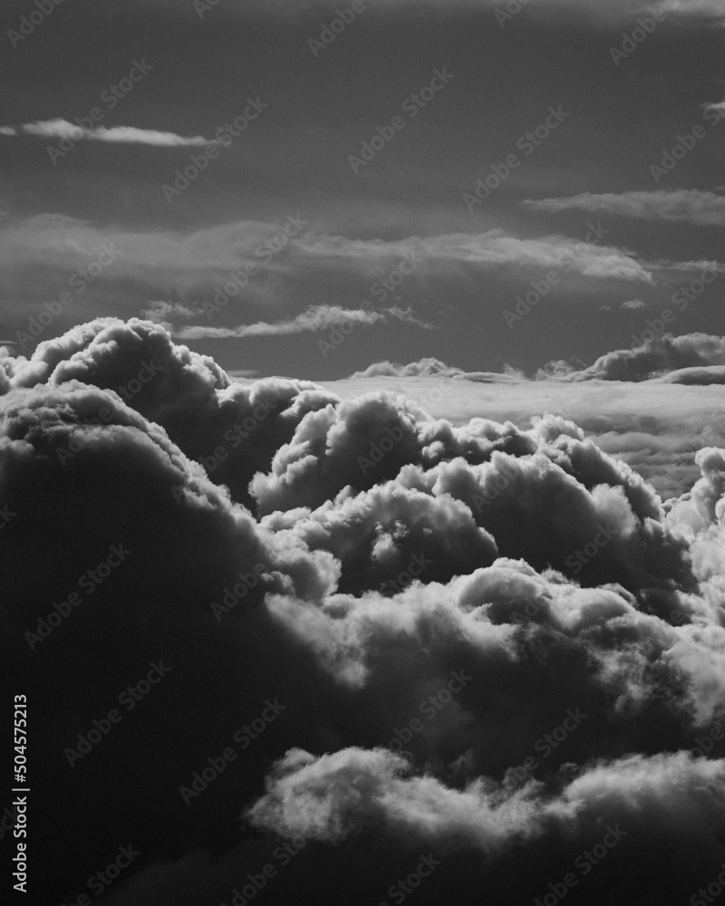 Black and white cumulus clouds from the air Stock Photo | Adobe Stock