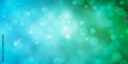 Light Blue, Green vector backdrop with dots.