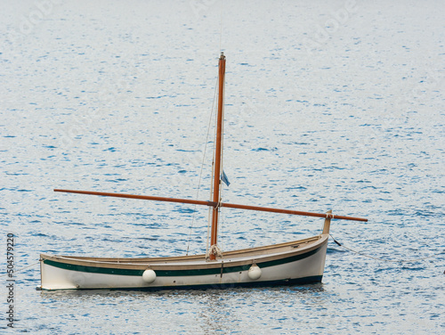 Gozzo, the Italian Riviera fishing boat, armed with lateen sail photo