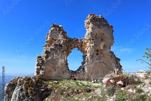 Rocca Calascio, view of ruins of mountaintop medieval fortress at 1512 meters above sea level. The Castle of Rocca Calascio is located within the Gran Sasso National Park, Abruzzo – Italy photo