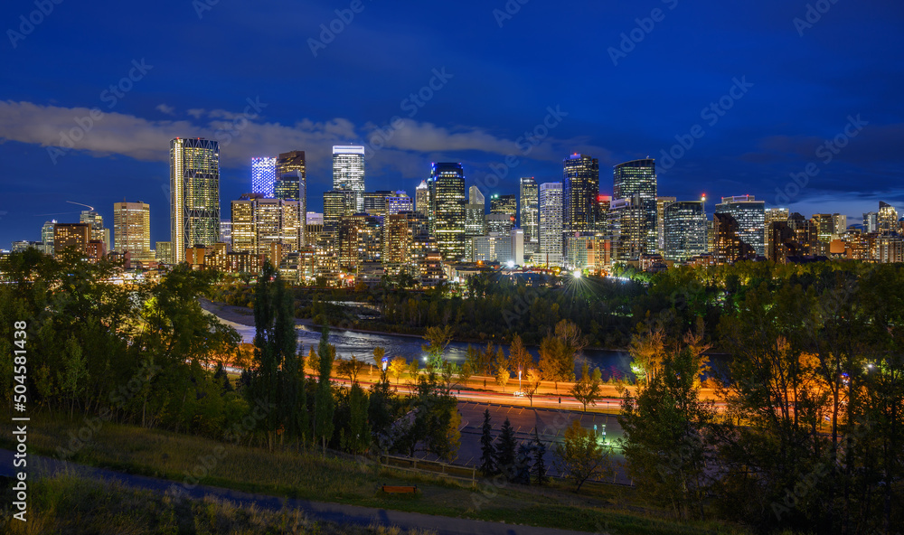 Skyline of Calgary with Bow River in Canada at night